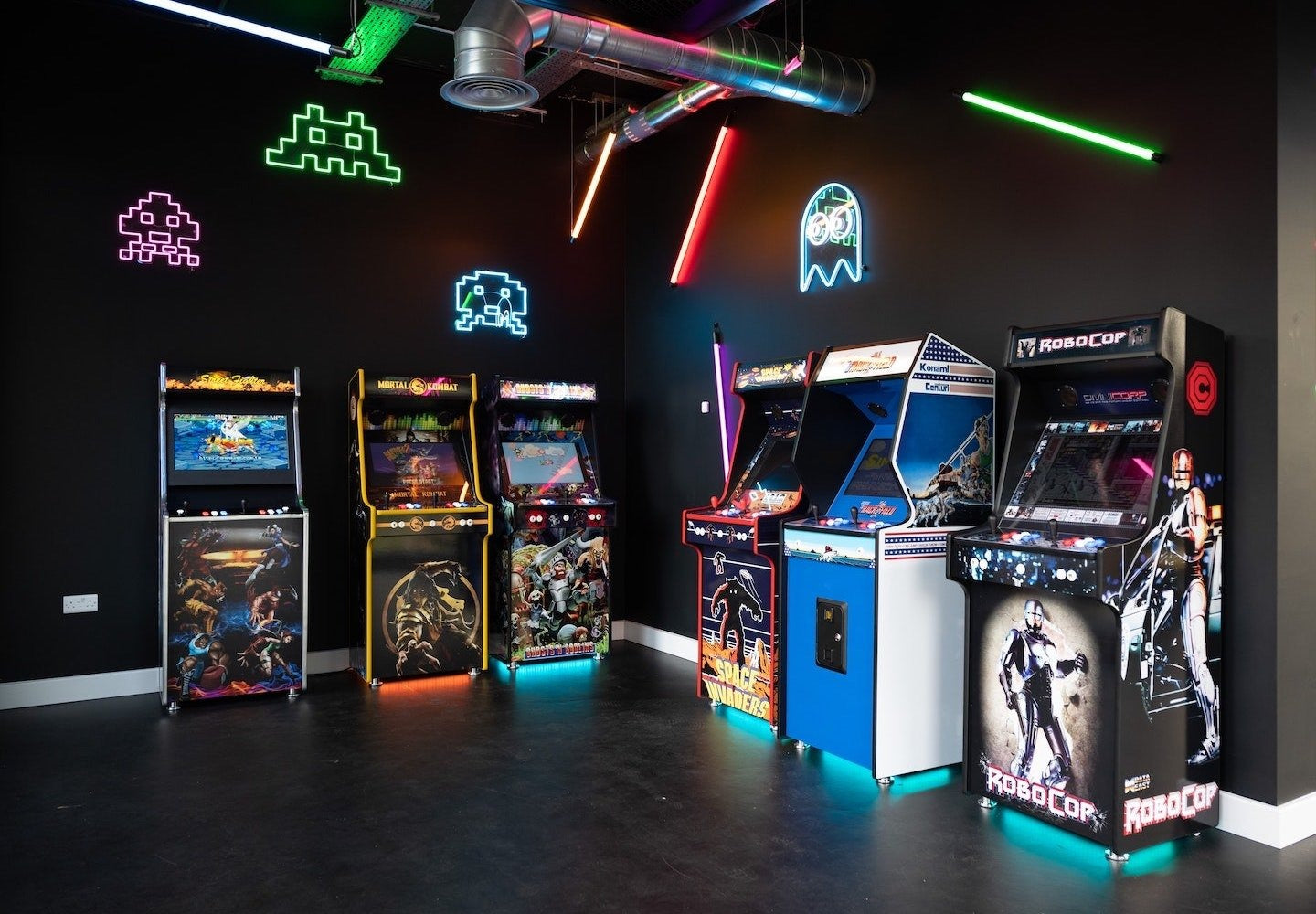 video game arcade machines setup with luminous glowing wall designs