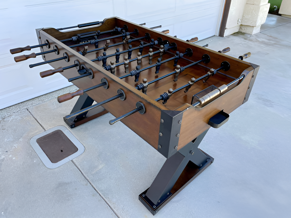 Classic foosball table with durable construction for home or office game rooms