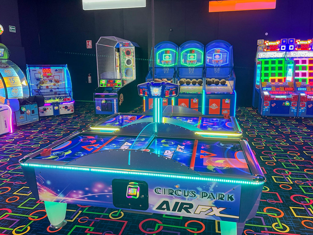 Air FX full-size 8-foot air hockey table with LED-lit playfield and ½-inch thick commercial-grade surface.