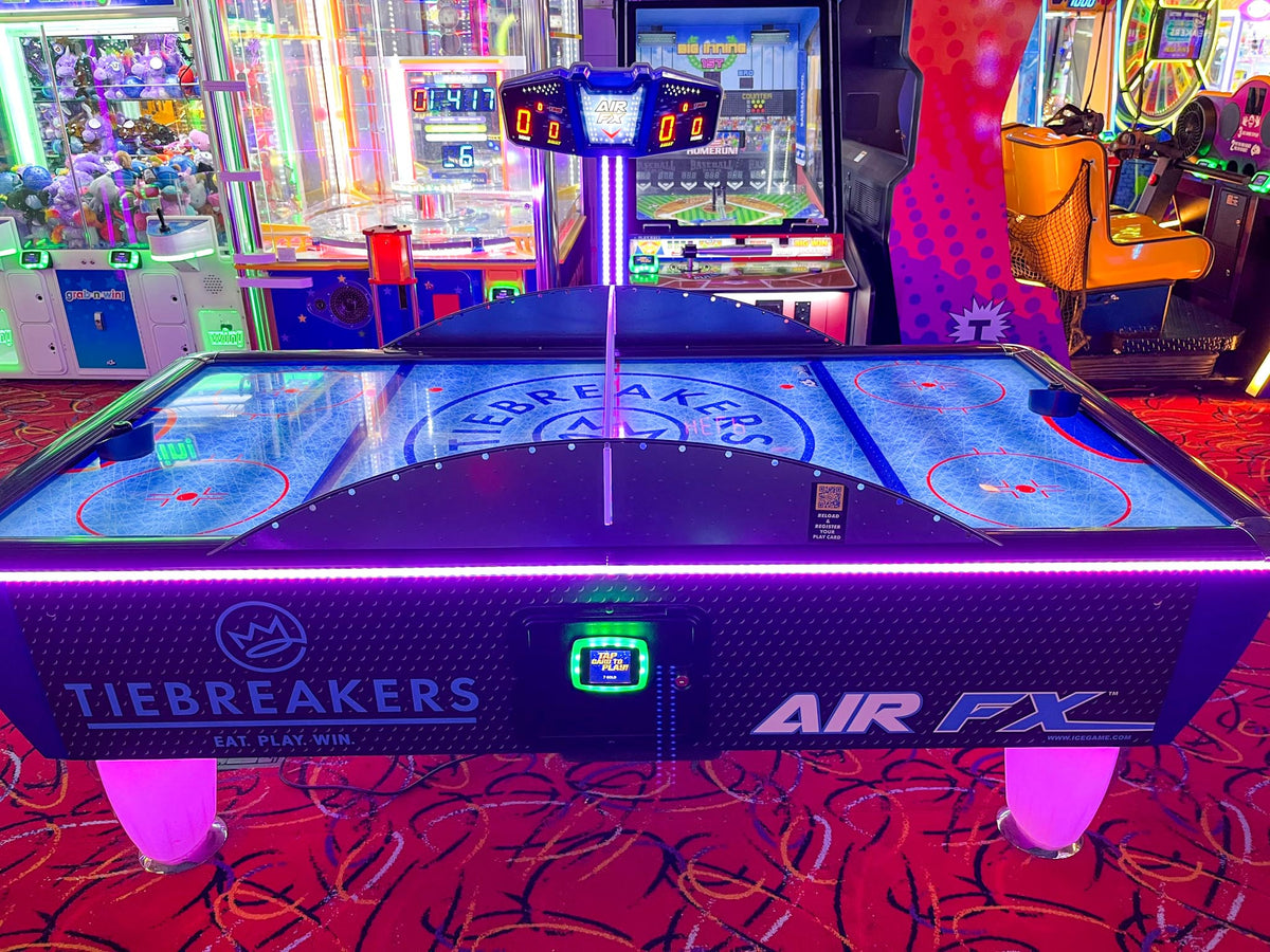 NHL Team Air FX full-size 8-foot air hockey table with LED playfield and custom team graphics