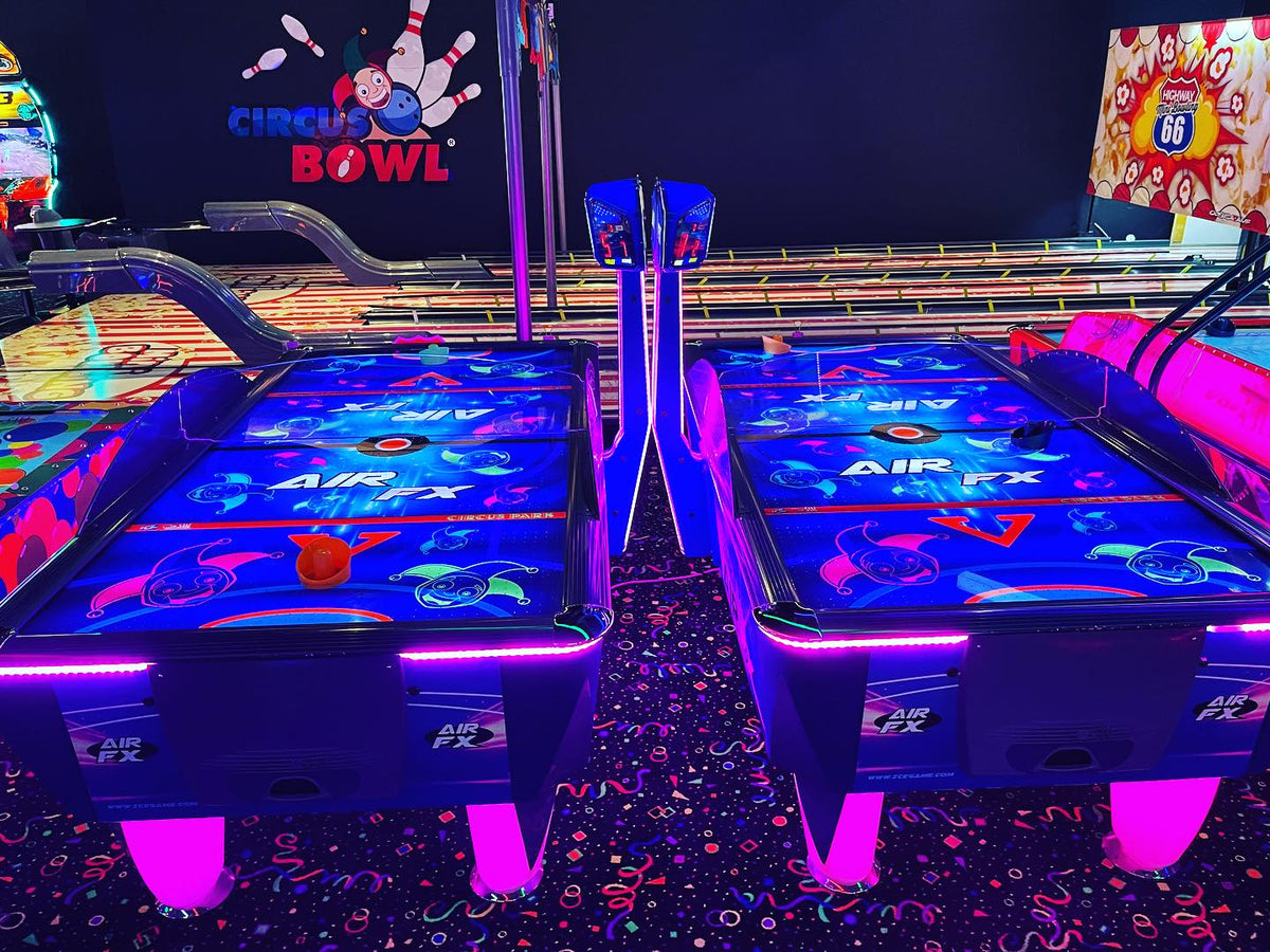 NHL Team Air FX full-size 8-foot air hockey table with LED playfield and custom team graphics