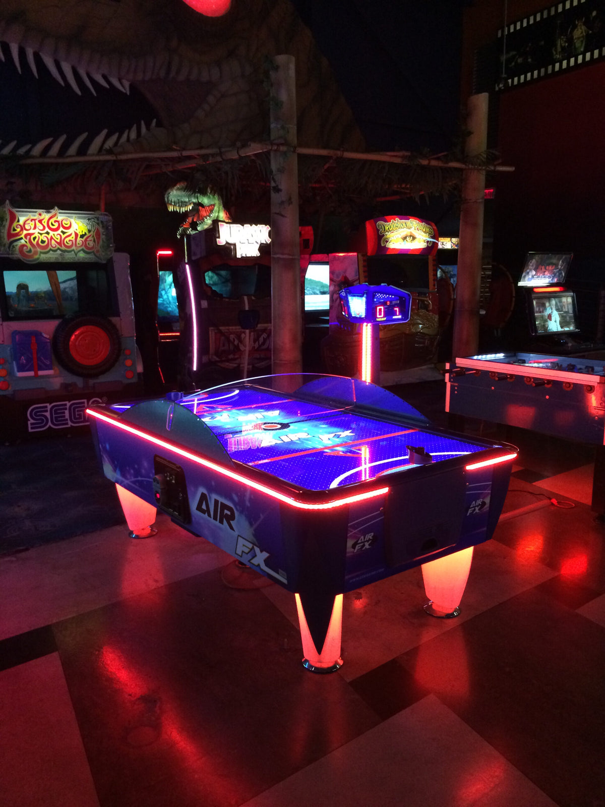 Air FX full-size 8-foot air hockey table with LED-lit playfield and ½-inch thick commercial-grade surface.