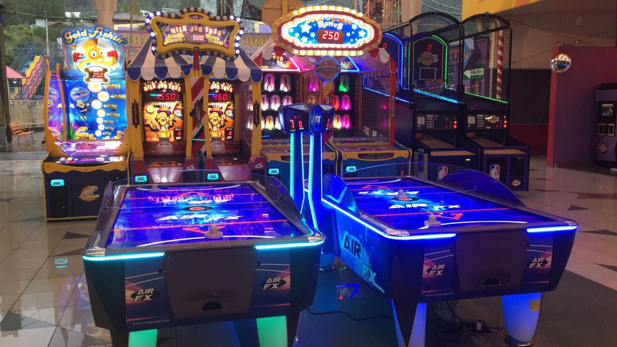 Air FX full-size 8-foot air hockey table with LED-lit playfield and ½-inch thick commercial-grade surface.