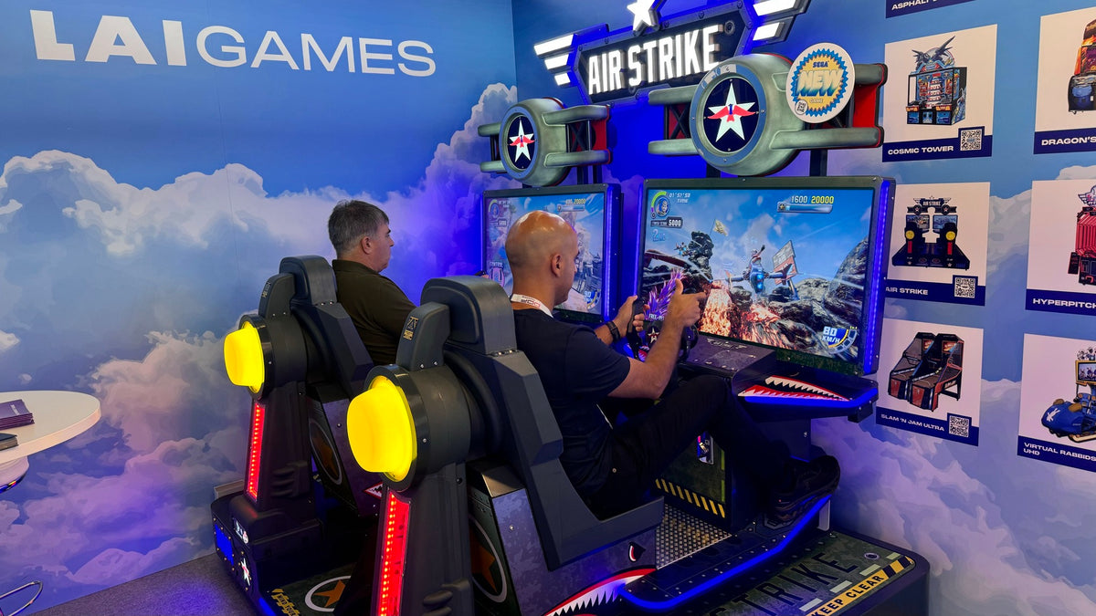 Air Strike arcade machine with 2-player flying simulator, pendulum motion seats, and optional ticket redemption.