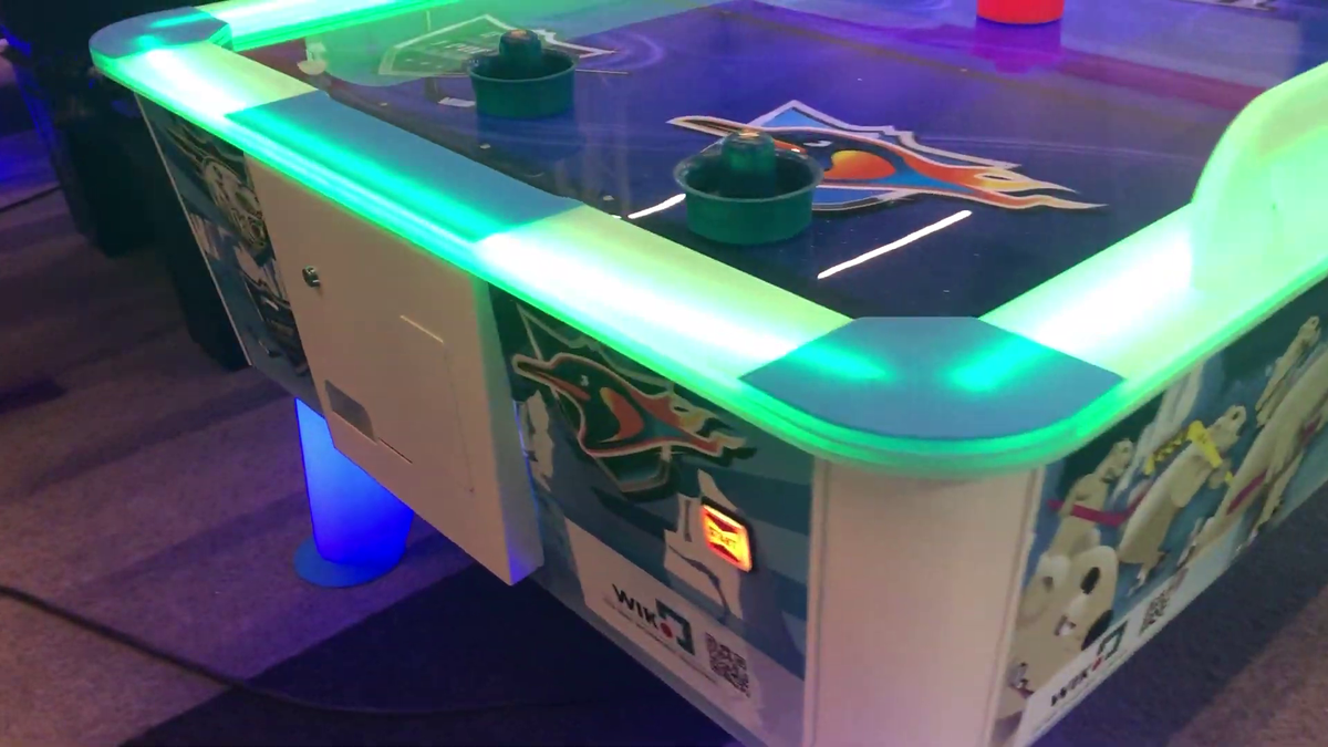 Arctic Air Hockey table with waterproof design, LED lighting, and two-player gameplay.
