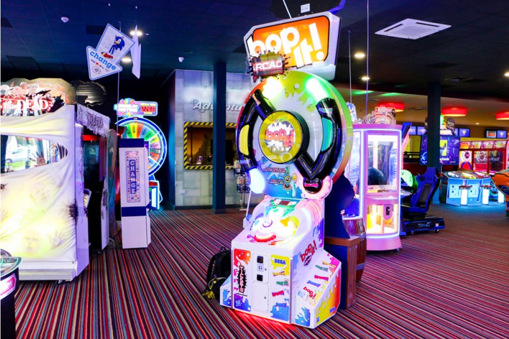 BOP IT! Arcade machine by Sega and Hasbro featuring large interactive buttons and skill-based gameplay