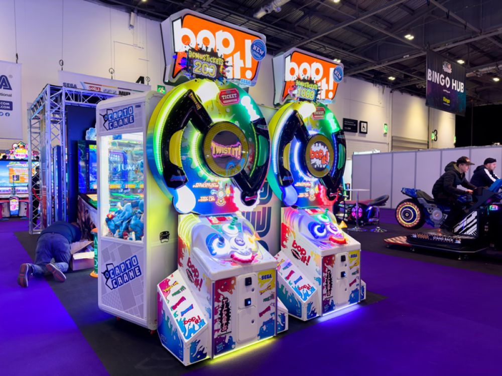 BOP IT! Arcade machine by Sega and Hasbro featuring large interactive buttons and skill-based gameplay