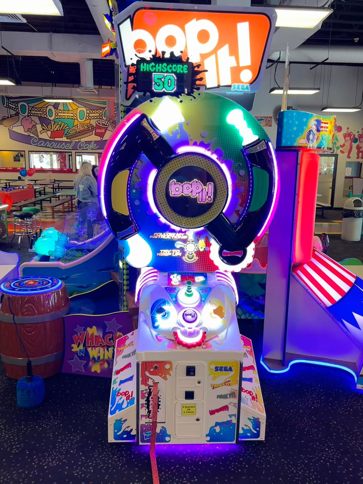 BOP IT! Arcade machine by Sega and Hasbro featuring large interactive buttons and skill-based gameplay