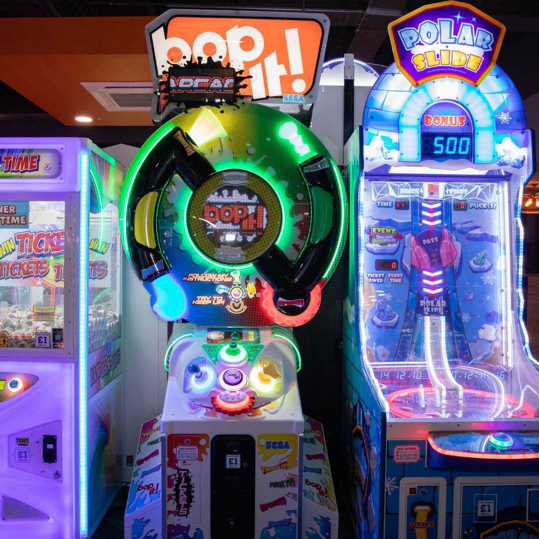 BOP IT! Arcade machine by Sega and Hasbro featuring large interactive buttons and skill-based gameplay