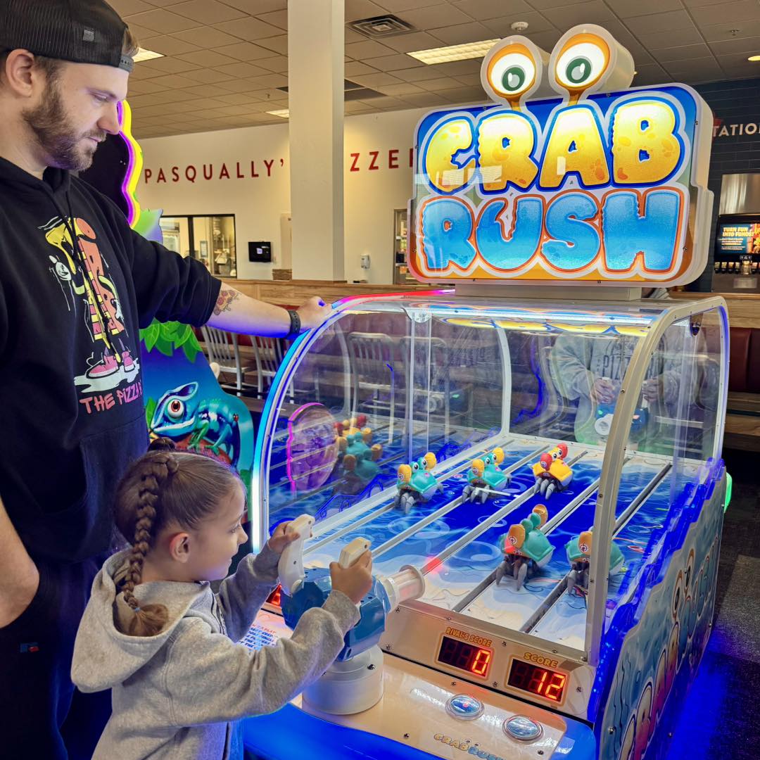 Bandai Namco Crab Rush arcade game with moving crab targets, two-player shooter action, and under-the-sea theme.
