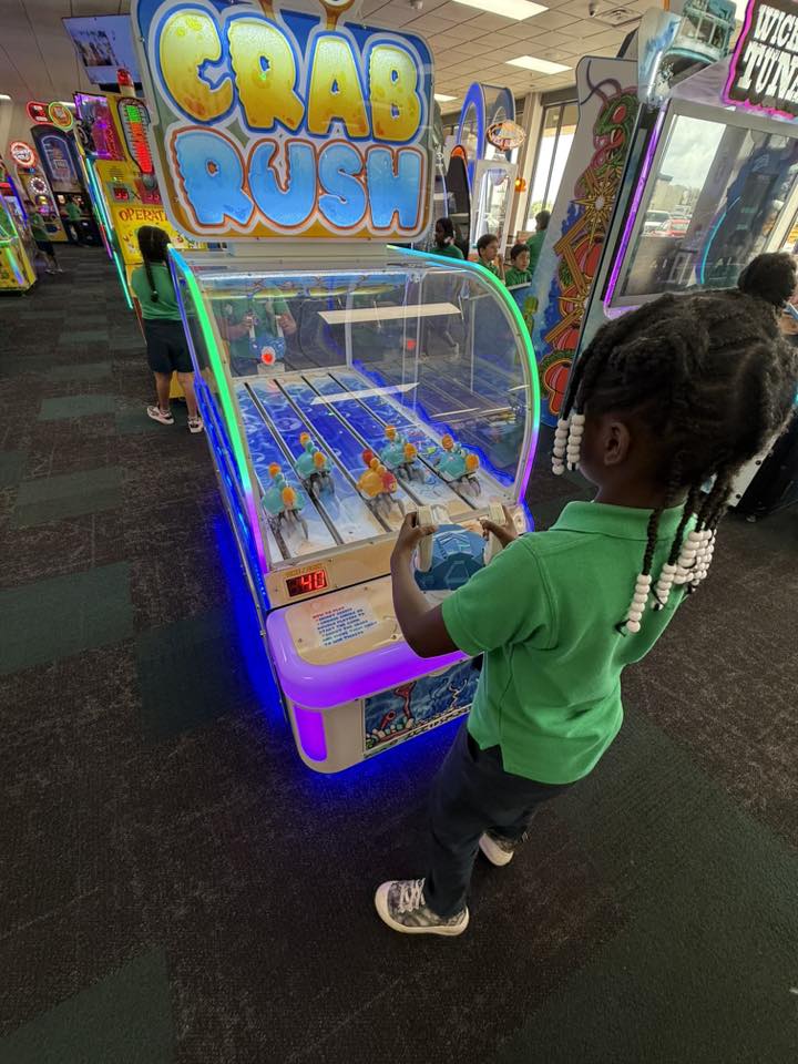 Bandai Namco Crab Rush arcade game with moving crab targets, two-player shooter action, and under-the-sea theme.