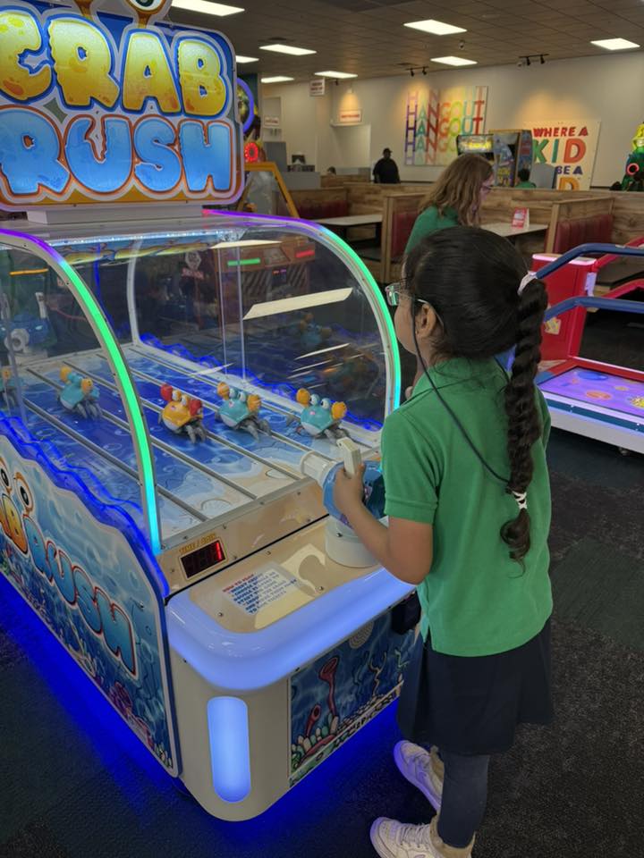 Bandai Namco Crab Rush arcade game with moving crab targets, two-player shooter action, and under-the-sea theme.