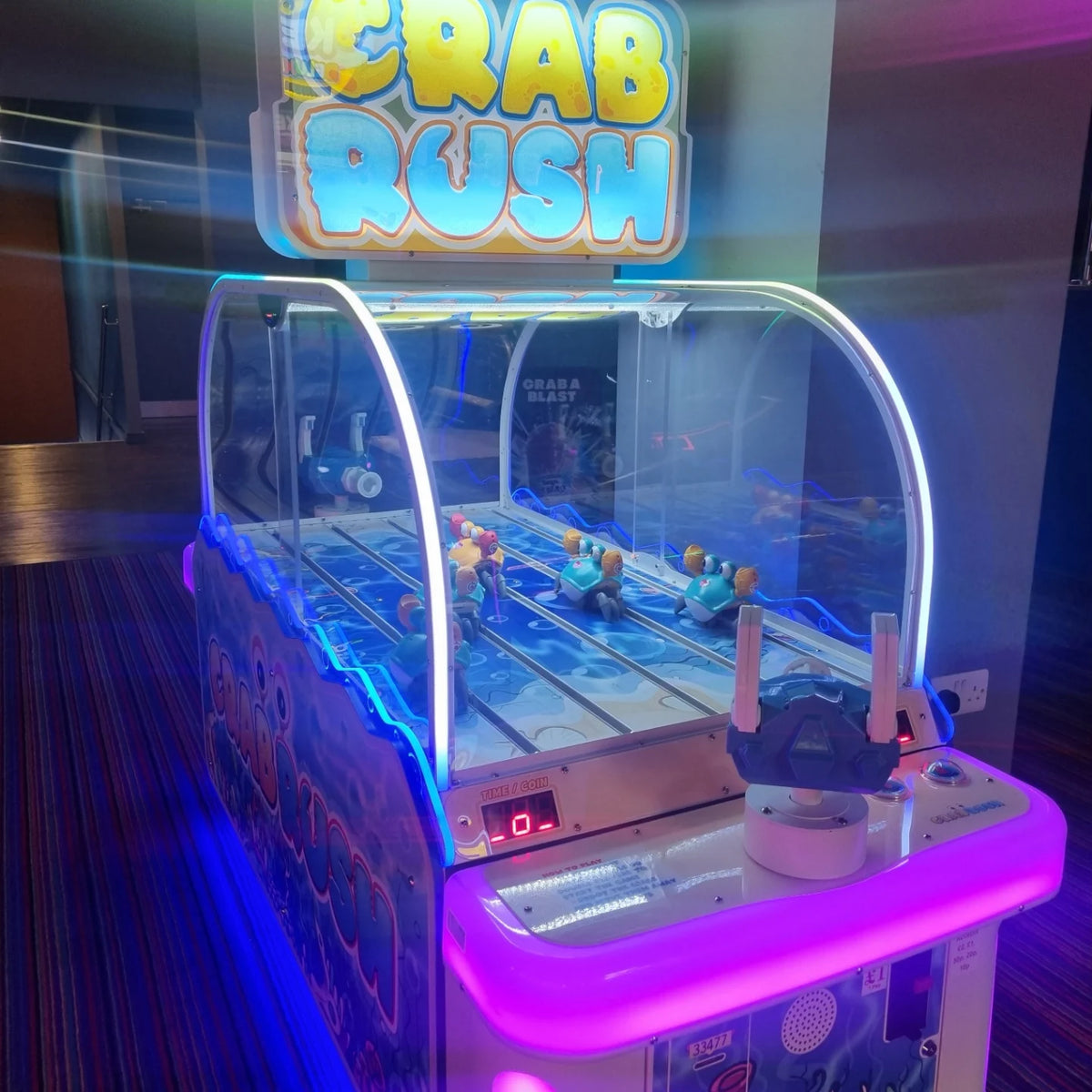 Bandai Namco Crab Rush arcade game with moving crab targets, two-player shooter action, and under-the-sea theme.