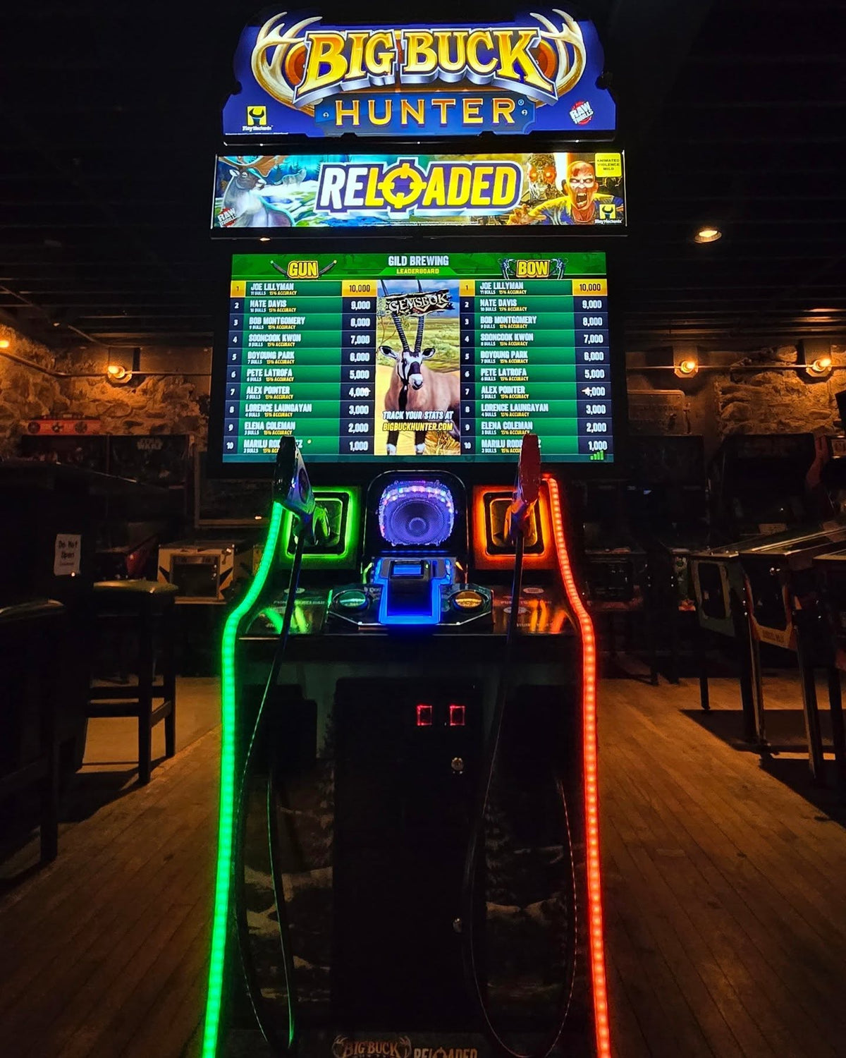 Big Buck Hunter Reloaded arcade game featuring online tournaments, DLC content, and immersive two-player hunting action.