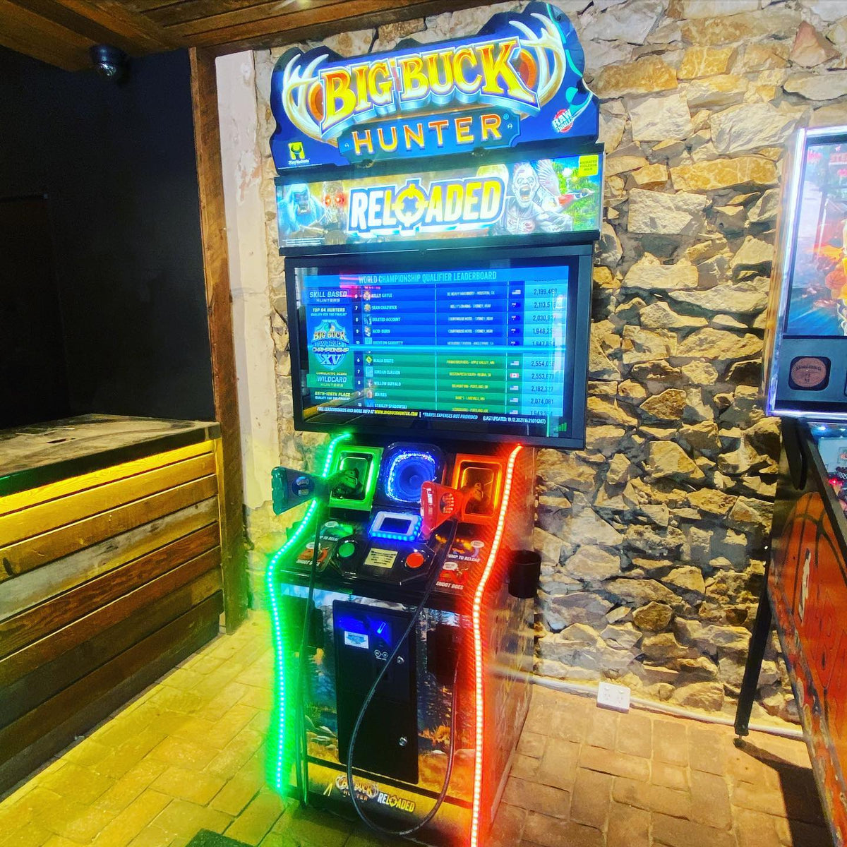 Big Buck Hunter Reloaded arcade game featuring online tournaments, DLC content, and immersive two-player hunting action.