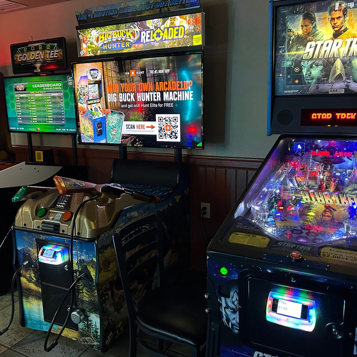 Big Buck Hunter Reloaded arcade game featuring online tournaments, DLC content, and immersive two-player hunting action.