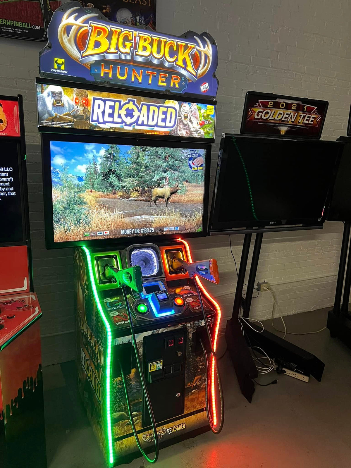 Front view of Big Buck Hunter Reloaded Panorama arcade machine showing widescreen hunting gameplay