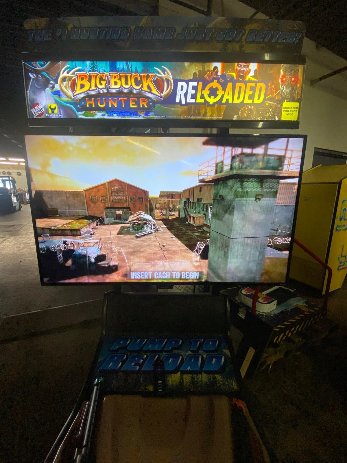 Front view of Big Buck Hunter Reloaded Panorama arcade machine showing widescreen hunting gameplay