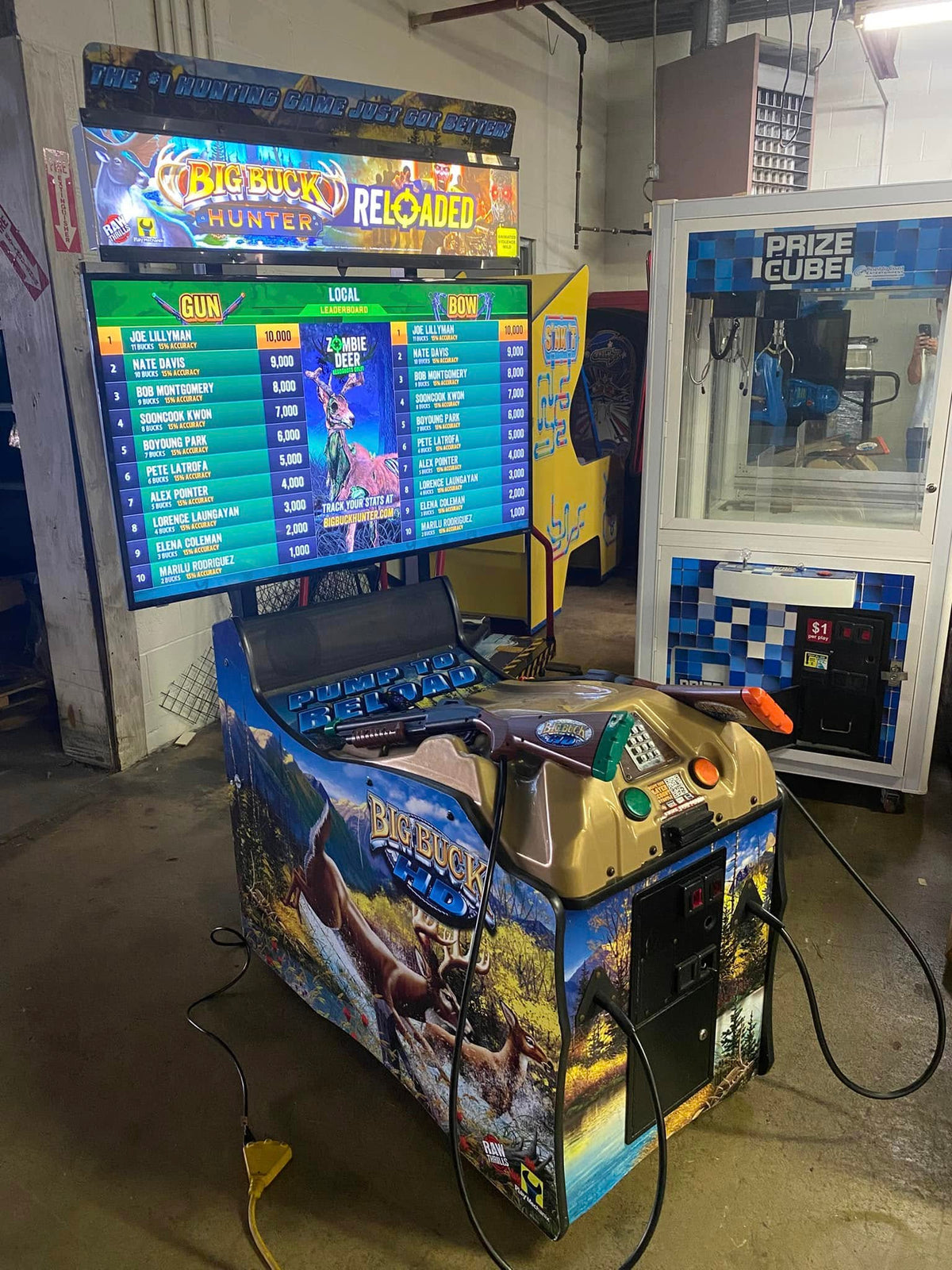 Side view of Big Buck Hunter Reloaded Panorama arcade machine showing widescreen hunting gameplay