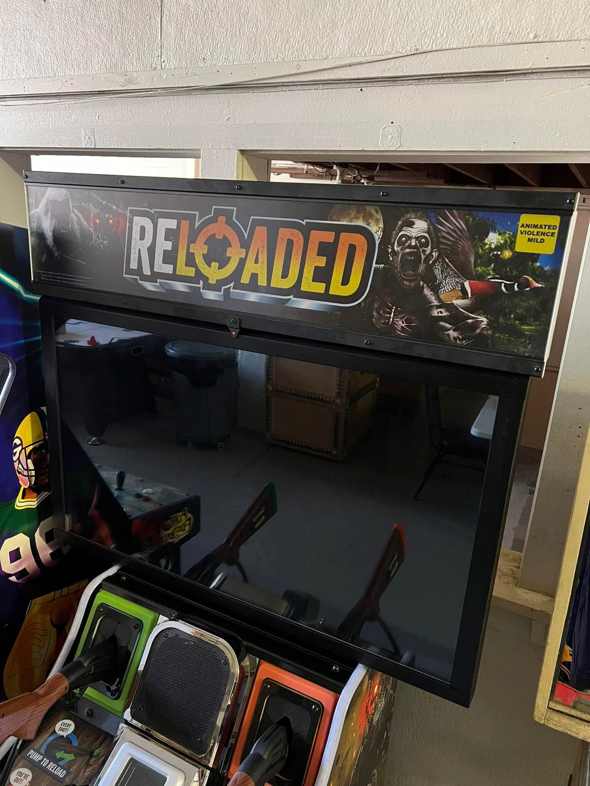 Front view of Big Buck Hunter Reloaded Panorama arcade machine showing widescreen hunting gameplay
