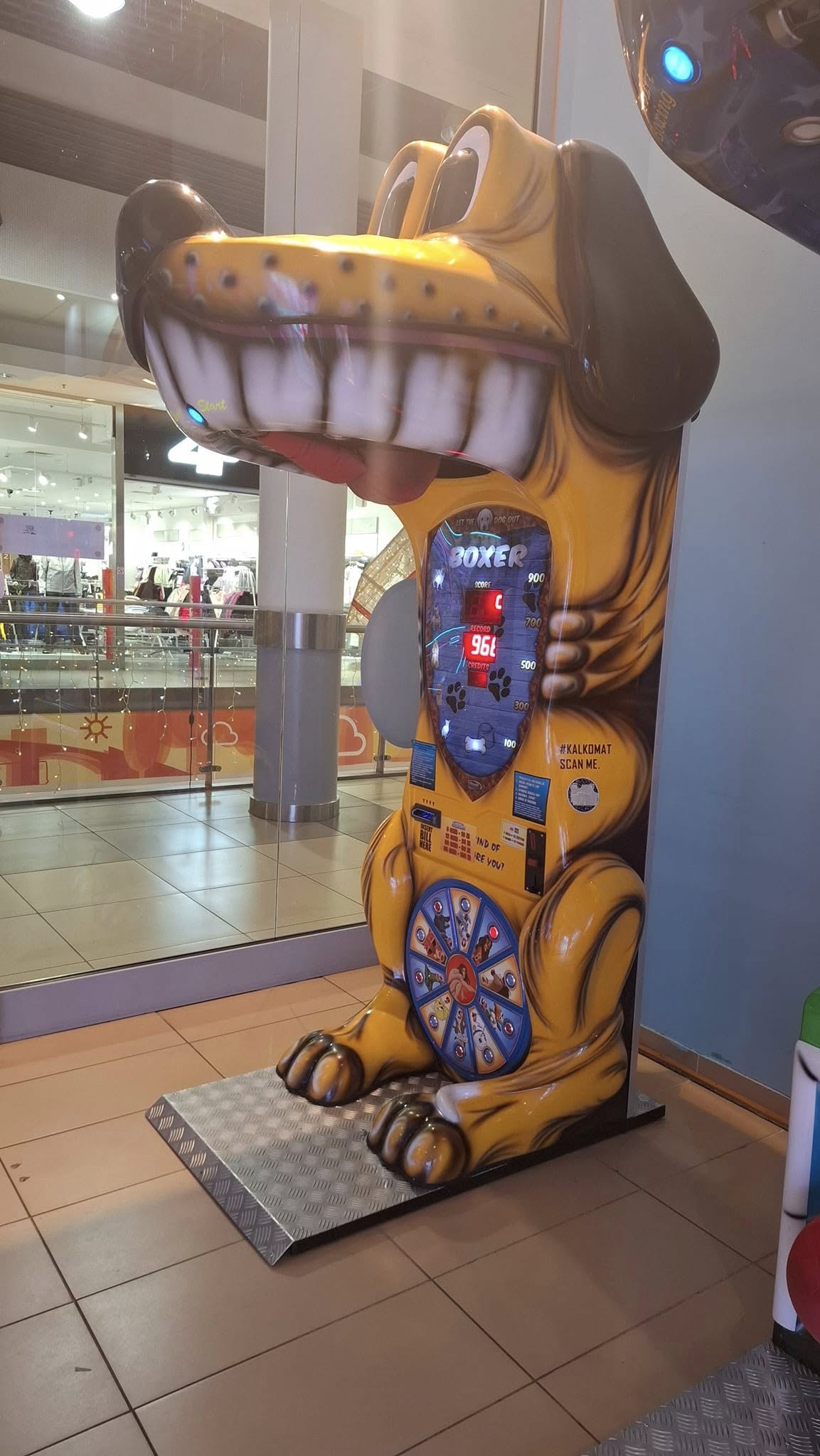 Boxer Dog kids boxing machine with fun animal sound effects and playful arcade attraction design.