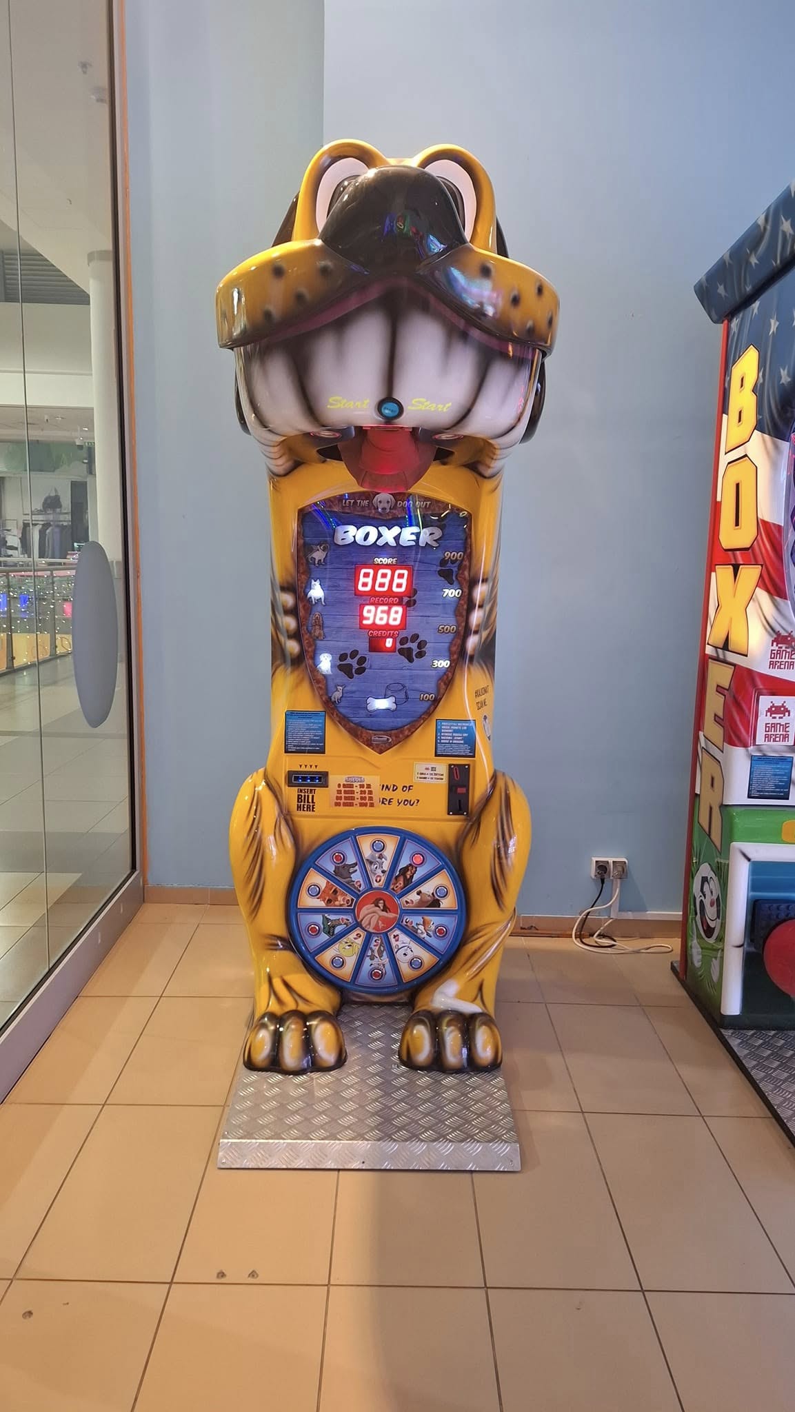 Boxer Dog kids boxing machine with fun animal sound effects and playful arcade attraction design.