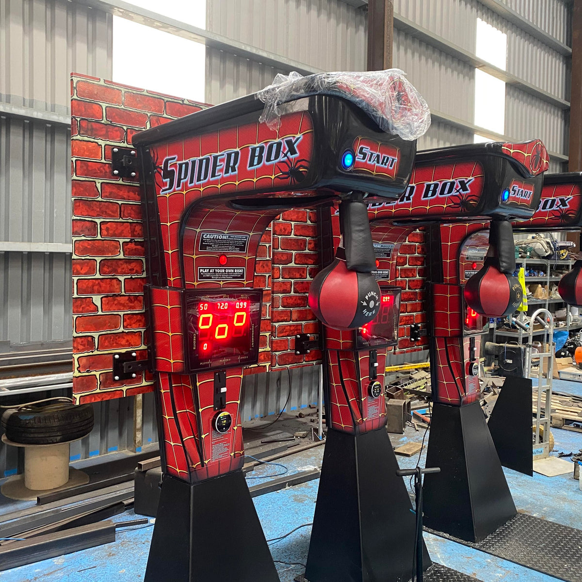 Boxer Spider compact boxing machine with space-saving design and optional wall-mount setup.