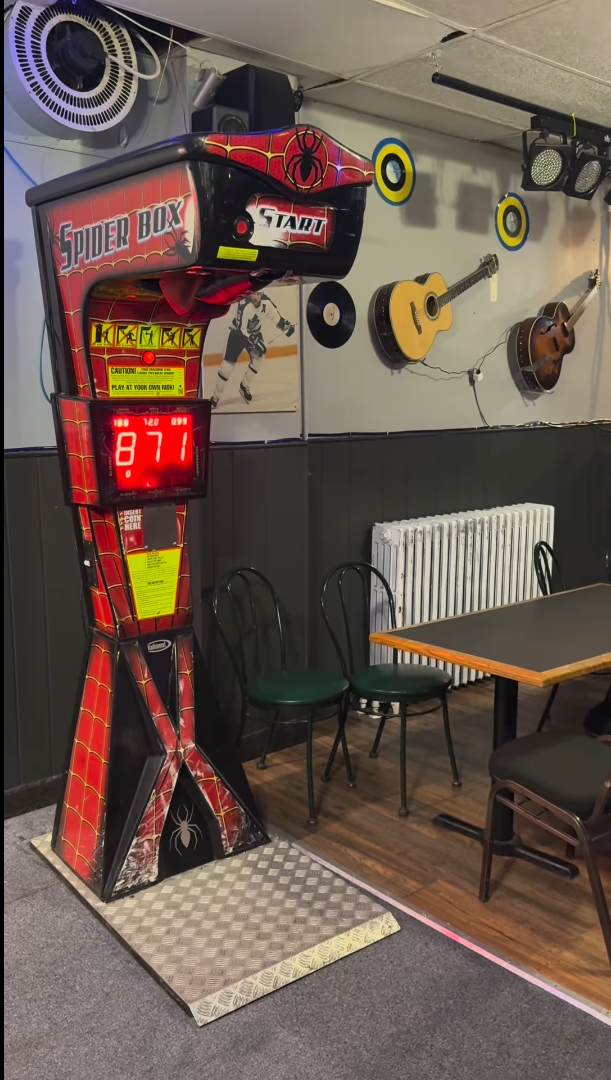 Boxer Spider compact boxing machine with space-saving design and optional wall-mount setup.