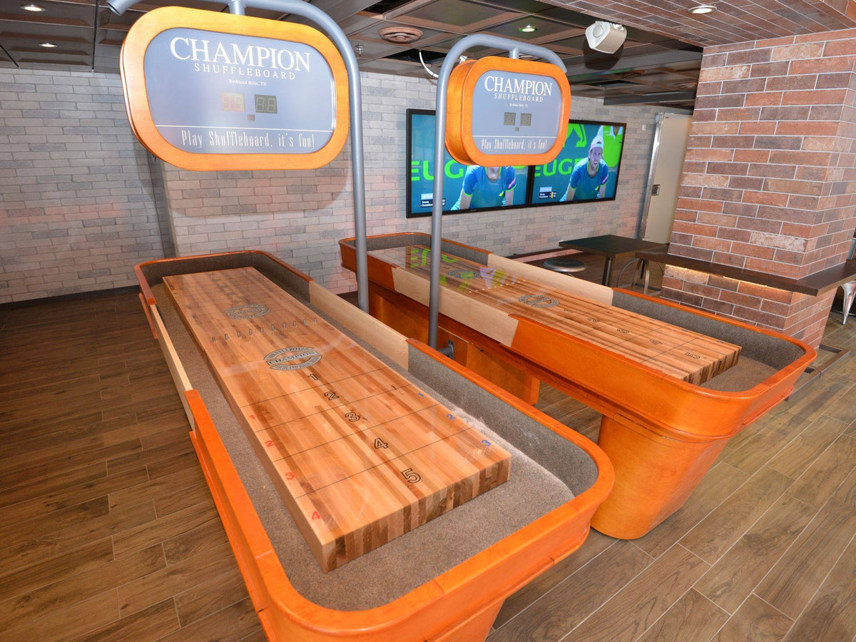 Capri shuffleboard table combining modern elegant design with classic smooth playfield and precision scoring