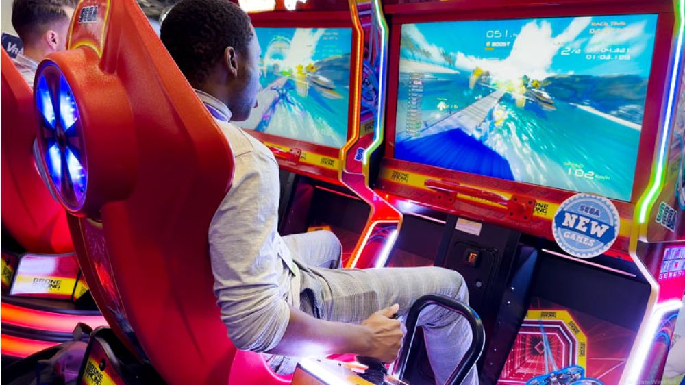 Drone Racing Genesis arcade machine by Sega with immersive drone racing cockpit and LED lighting