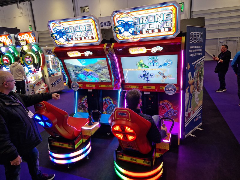 Drone Racing Genesis arcade machine by Sega with immersive drone racing cockpit and LED lighting