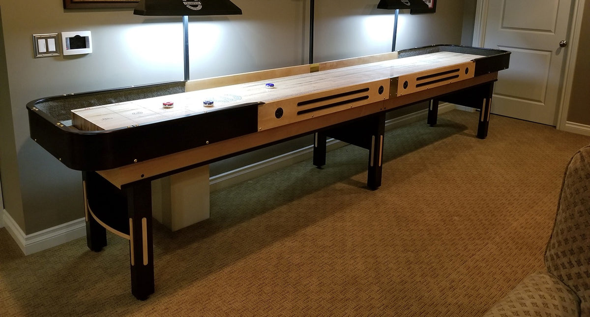 Grand Champion shuffleboard table with legendary smooth playfield and durable hand-crafted construction