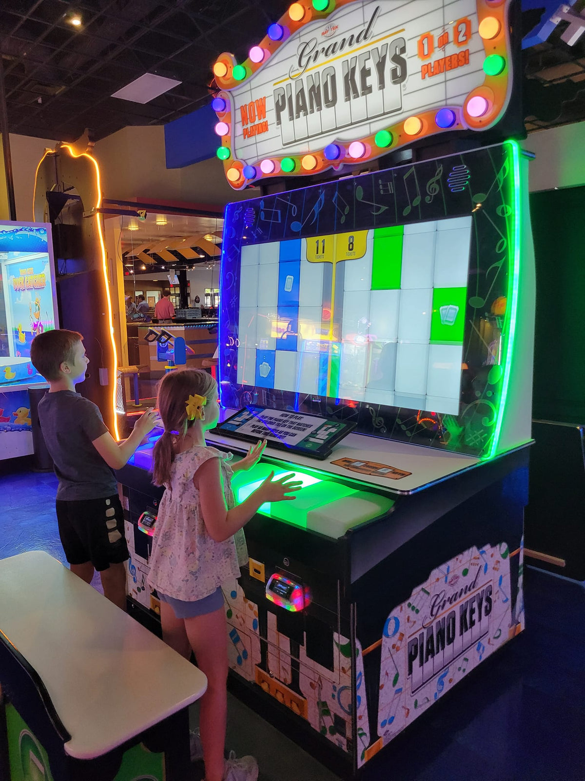 Grand Piano Keys arcade machine featuring musical skill gameplay and ticket redemption rewards.