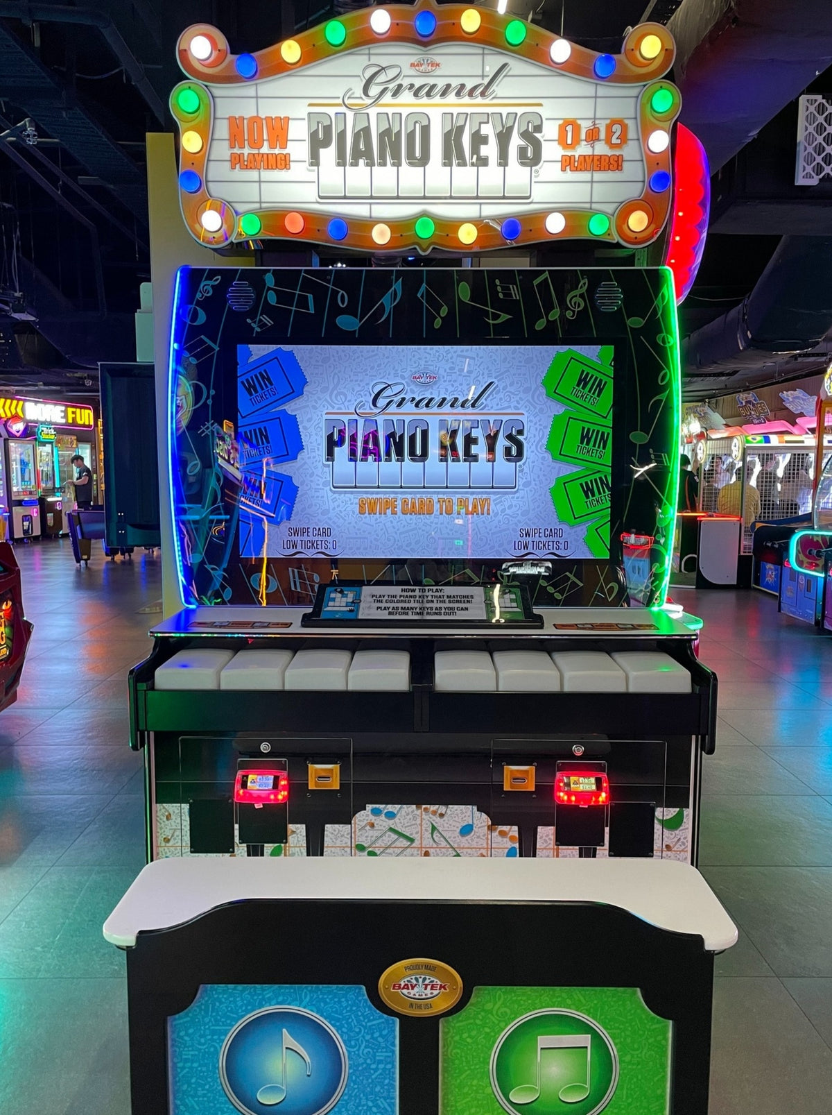 Grand Piano Keys arcade machine featuring musical skill gameplay and ticket redemption rewards.