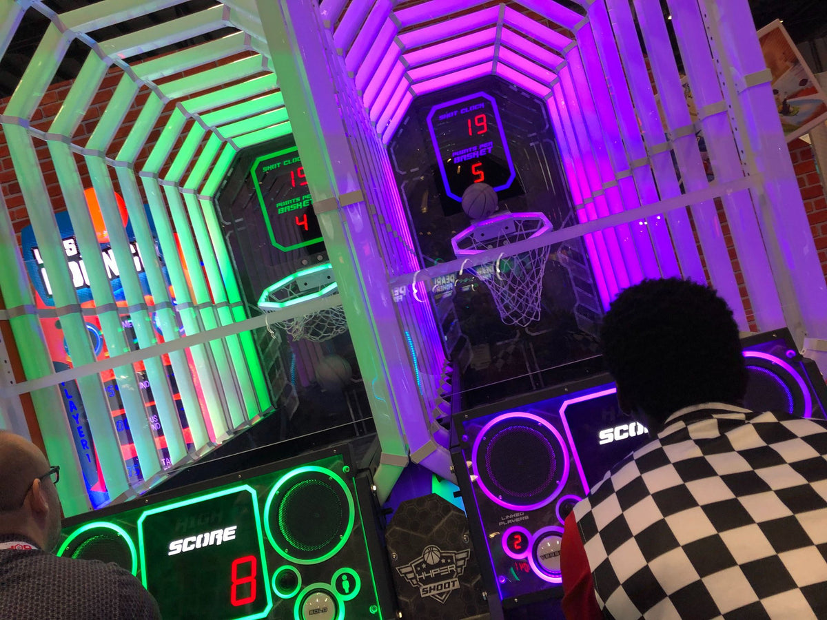 HYPERshoot arcade basketball game with interactive light tunnel and fast-paced multiplayer action.