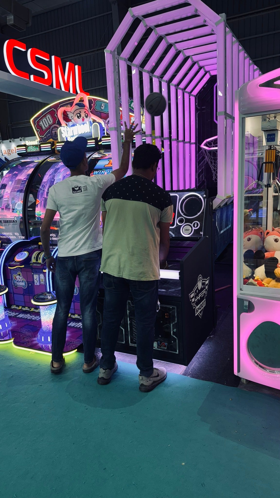 HYPERshoot arcade basketball game with interactive light tunnel and fast-paced multiplayer action.