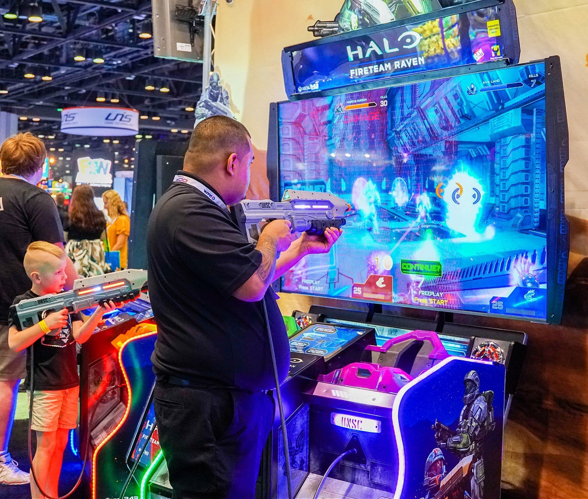 Raw Thrills Halo Fireteam Raven arcade game featuring six missions, immersive multiplayer action, and realistic gun controls.