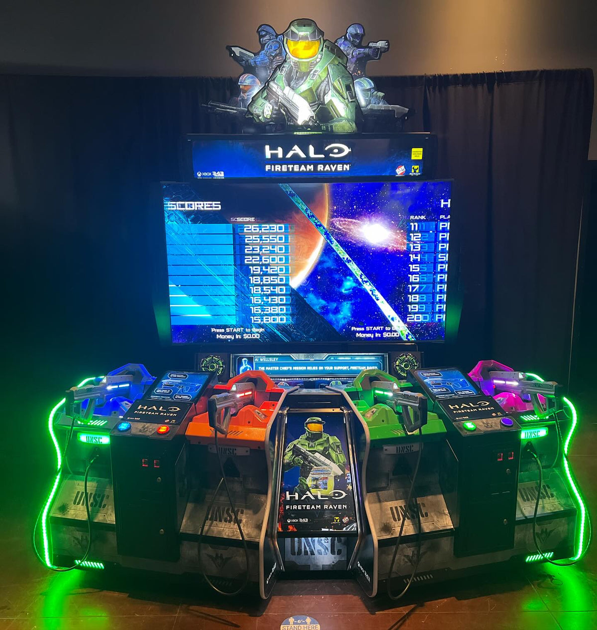 Raw Thrills Halo Fireteam Raven arcade game featuring six missions, immersive multiplayer action, and realistic gun controls.