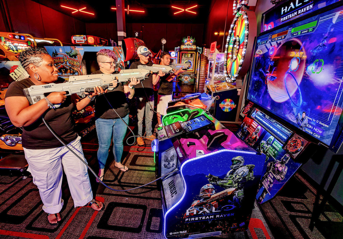 Raw Thrills Halo Fireteam Raven arcade game featuring six missions, immersive multiplayer action, and realistic gun controls.