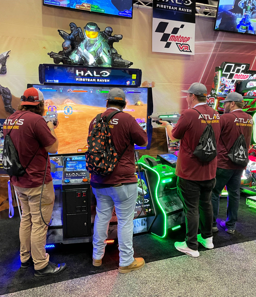 Raw Thrills Halo Fireteam Raven arcade game featuring six missions, immersive multiplayer action, and realistic gun controls.