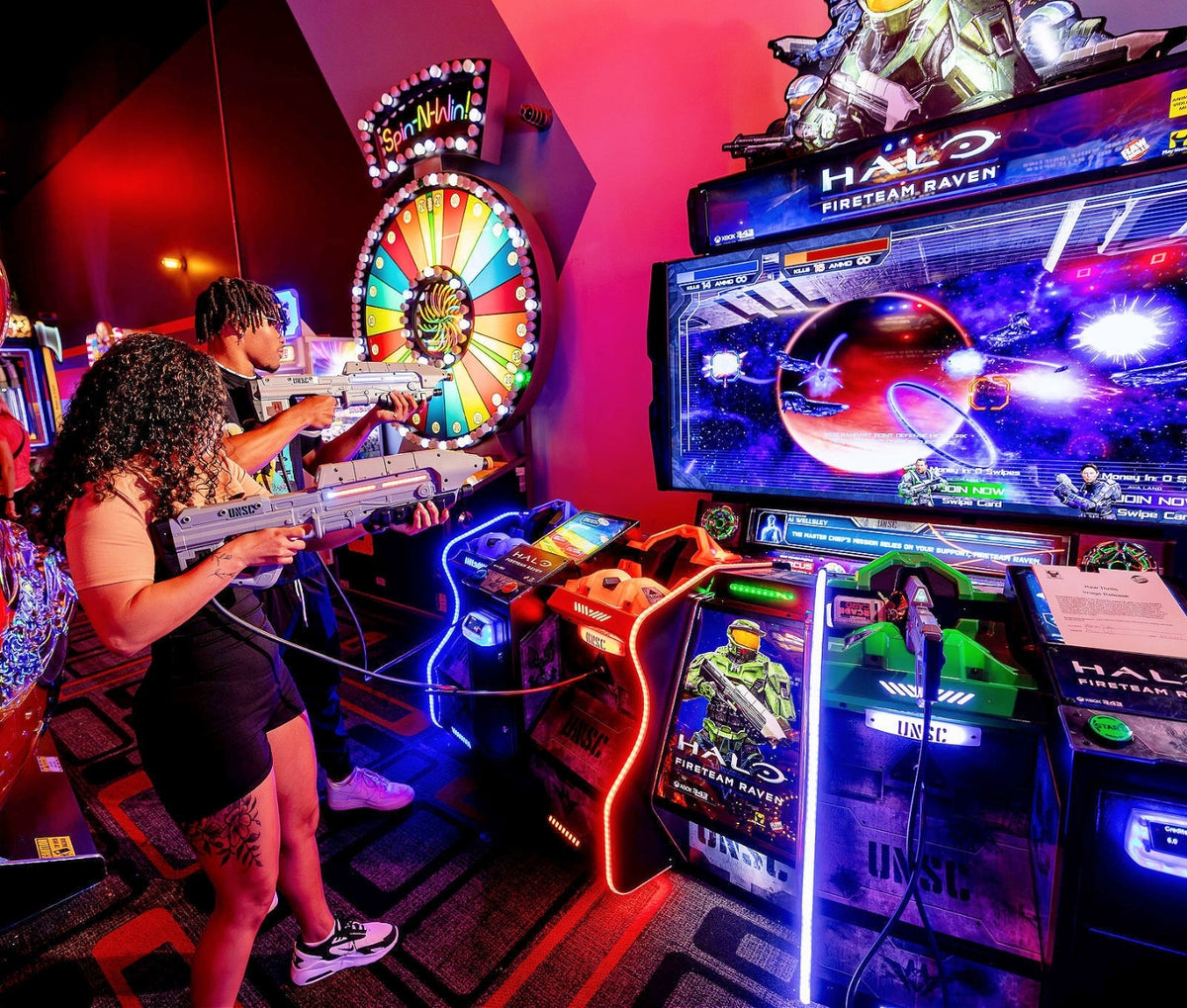 Raw Thrills Halo Fireteam Raven arcade game featuring six missions, immersive multiplayer action, and realistic gun controls.