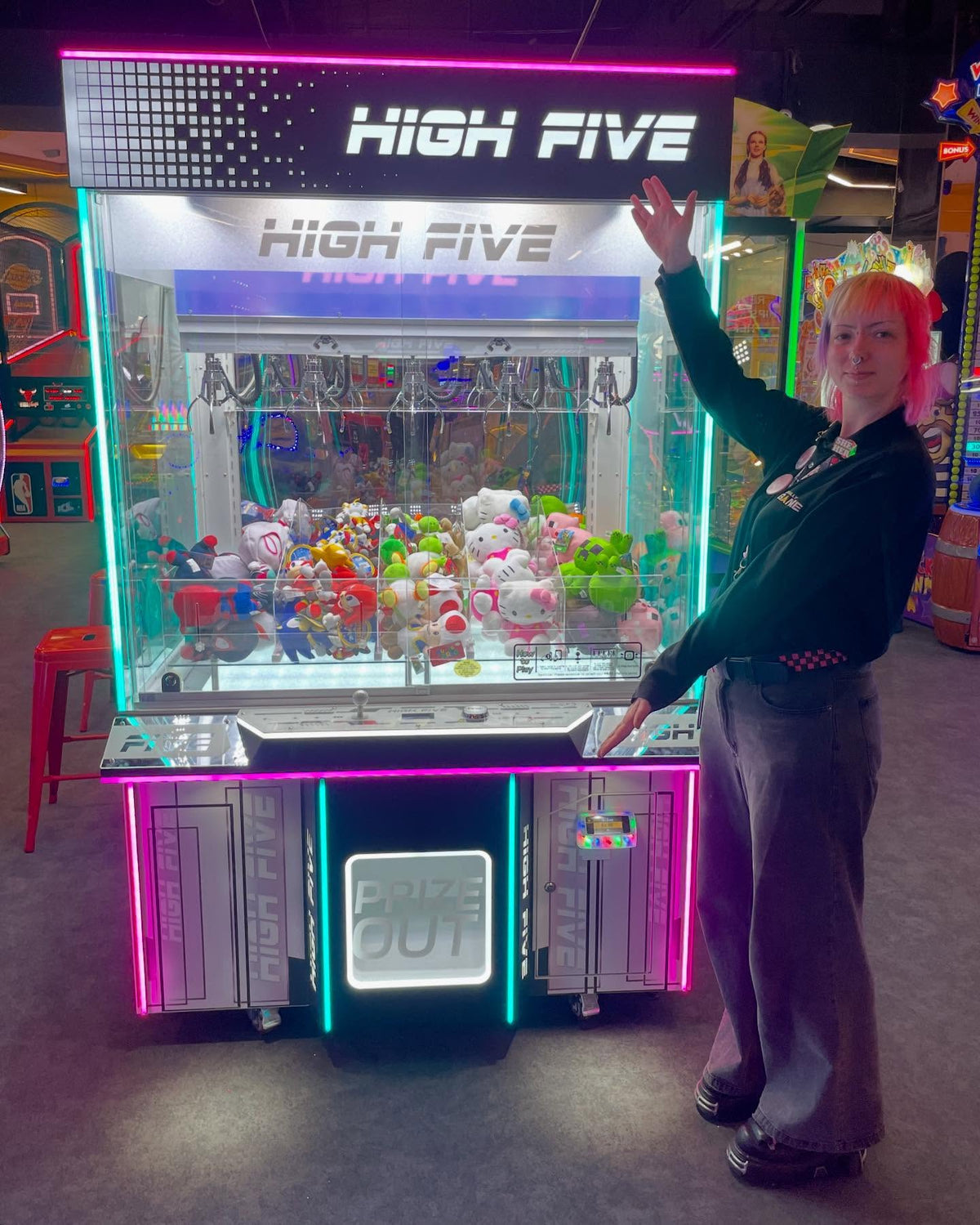 High Five five-claw prize crane arcade machine with large glass display and multi-claw prize system