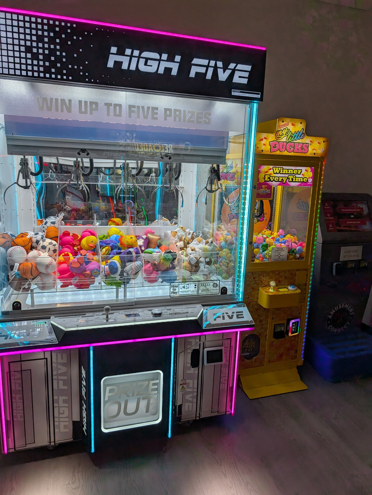 High Five five-claw prize crane arcade machine with large glass display and multi-claw prize system