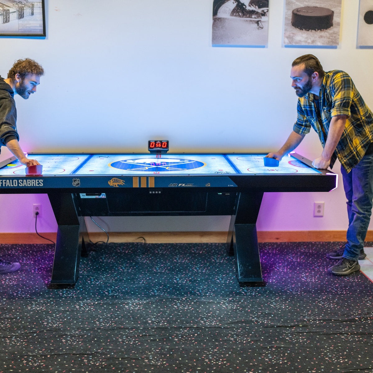 Home Air FX Pro 8-foot air hockey table with LED-backlit playfield, powder-coated steel frame, and hardwood accents.
