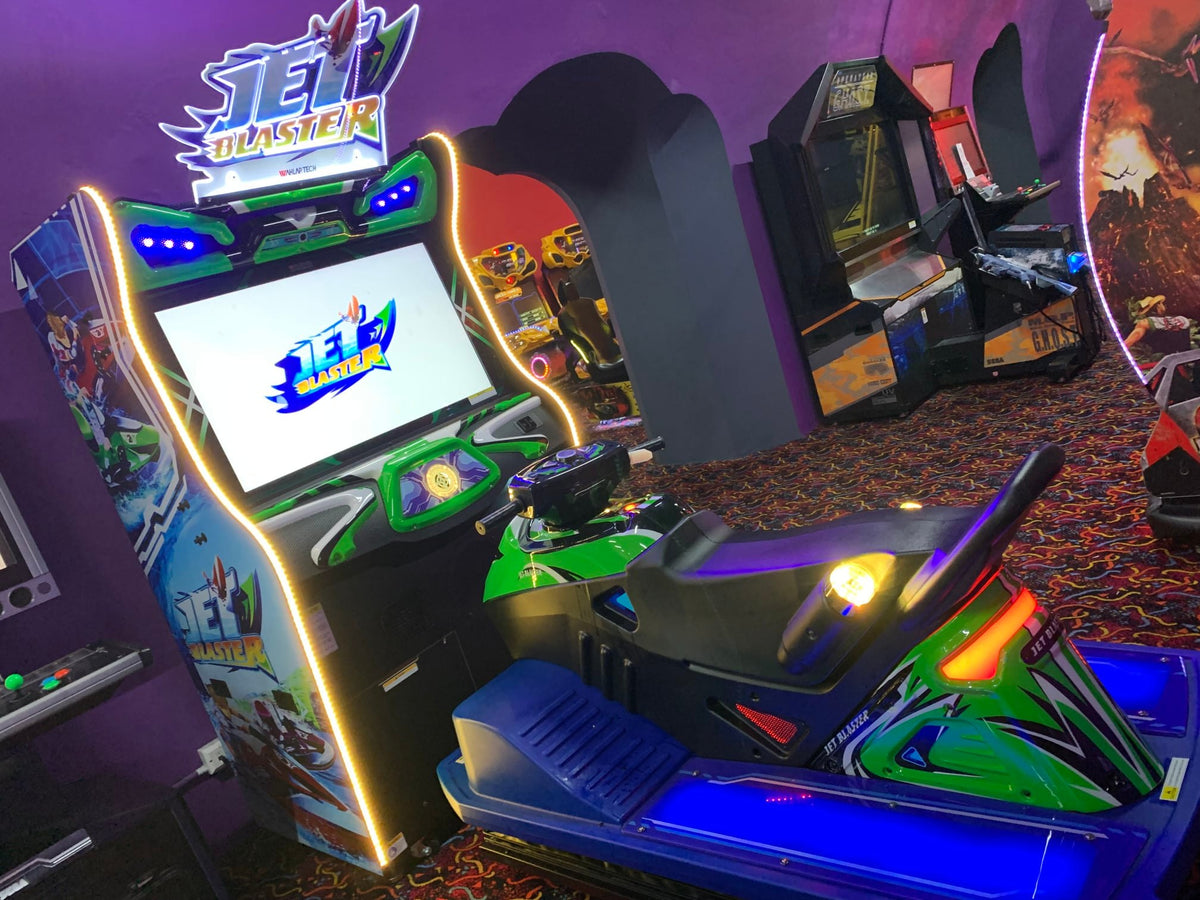Jet Blaster arcade racing game featuring handlebars, LED effects, and realistic watercraft motion simulation