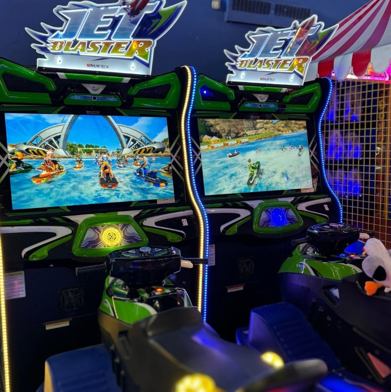 Jet Blaster arcade racing game featuring handlebars, LED effects, and realistic watercraft motion simulation