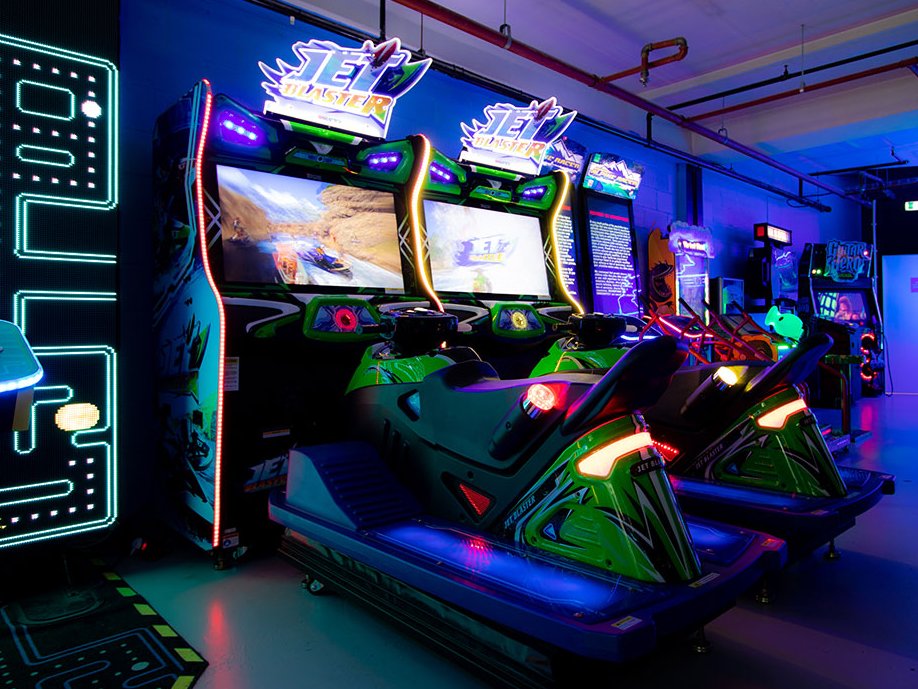 Jet Blaster arcade racing game featuring handlebars, LED effects, and realistic watercraft motion simulation