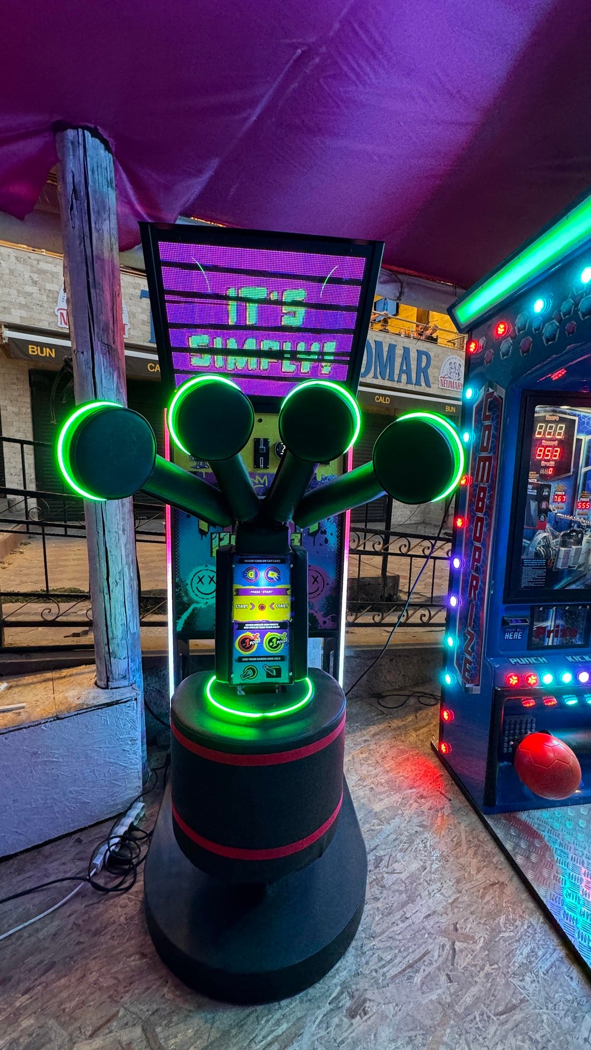 MMA Boxer arcade game featuring punch, kick, and jab challenges with multi-pad gameplay and family-friendly graphics.