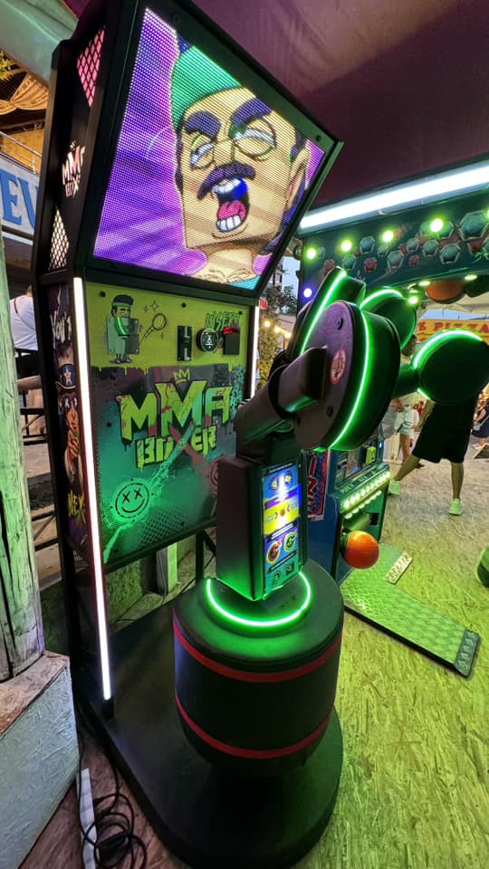 MMA Boxer arcade game featuring punch, kick, and jab challenges with multi-pad gameplay and family-friendly graphics.