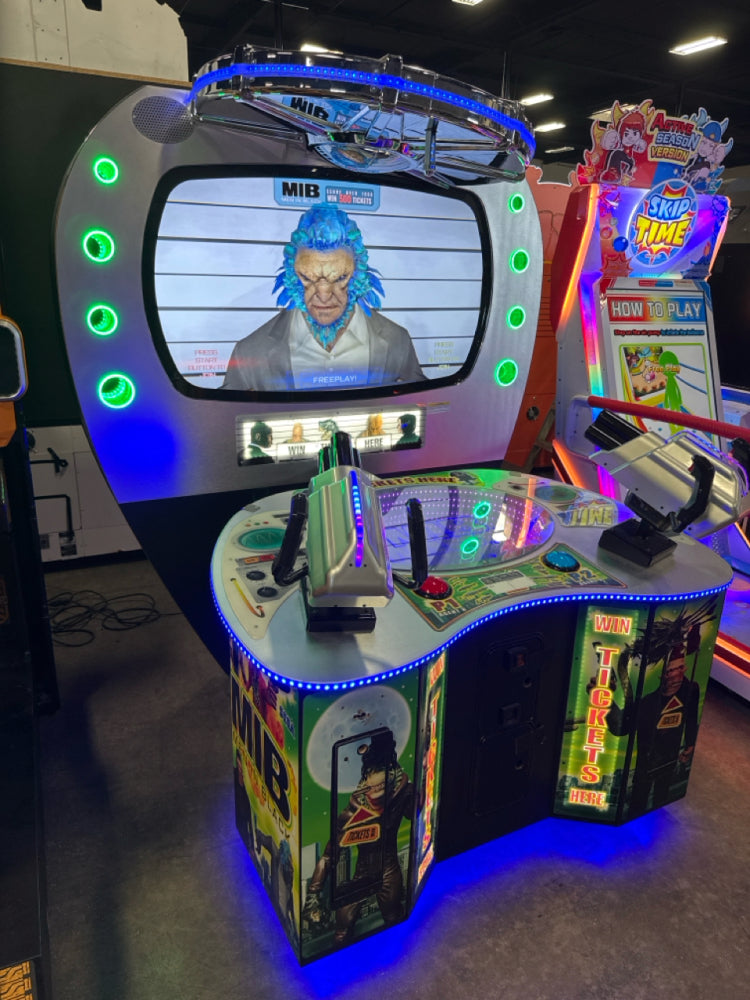 Men in Black skill-based video redemption arcade machine with interactive shooting gameplay and themed graphics